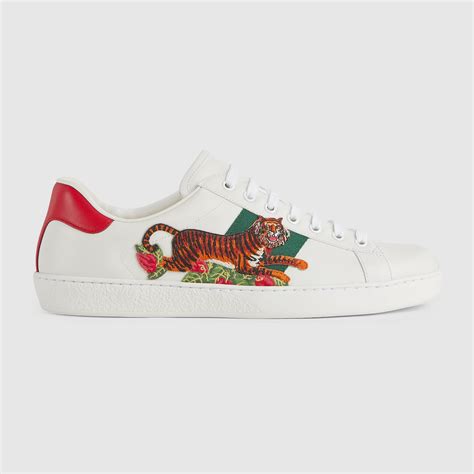 gucci tiger head sneakers|Gucci tiger button up.